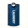 A navy blue foldable laundry basket with padded handles shown against a white background.