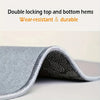 Close-up of a gray doormat with double locking top and bottom hems showing its texture.