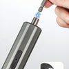A hand is using a self-priming chuck SDS quick change clamp on an electric screwdriver to attach a drill bit.