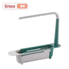 A green adjustable over-sink dish drying rack with a white tray and a long handle.