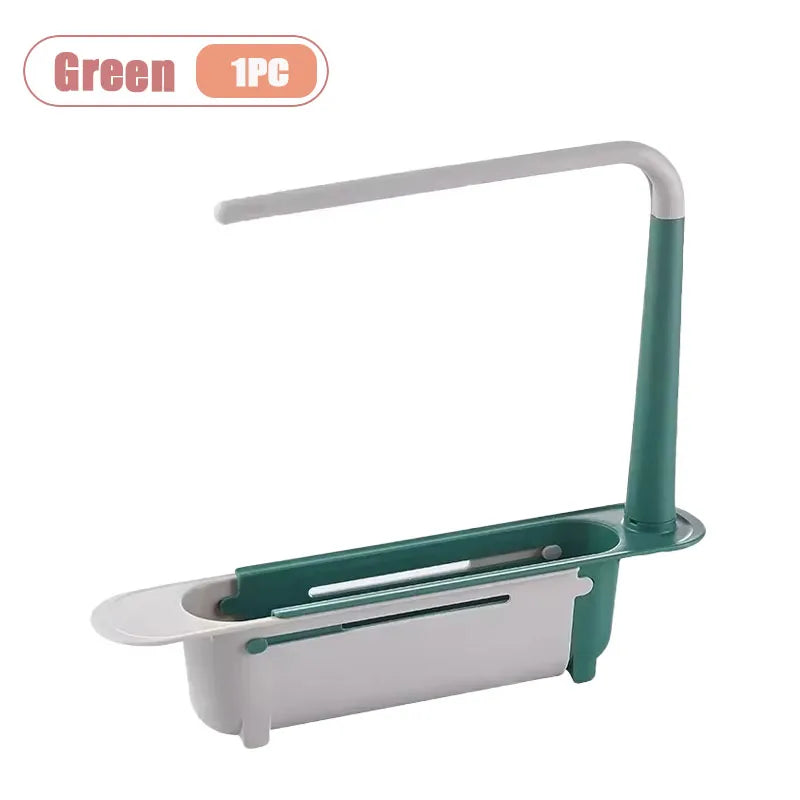 A green adjustable over-sink dish drying rack with a white tray and a long handle.