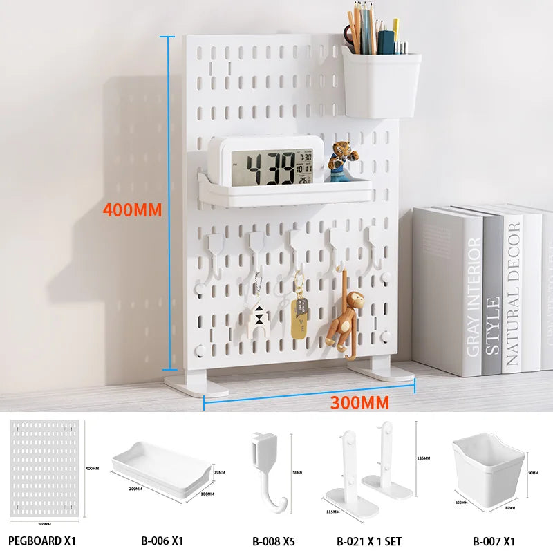 A white desktop pegboard organizer featuring multiple shelves, hooks, and storage compartments for tools and supplies.