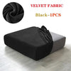 Black velvet fabric sofa cover shown draped on a gray sofa cushion.