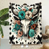 A flannel blanket featuring a detailed illustration of a Highland cow head with floral and foliage designs.
