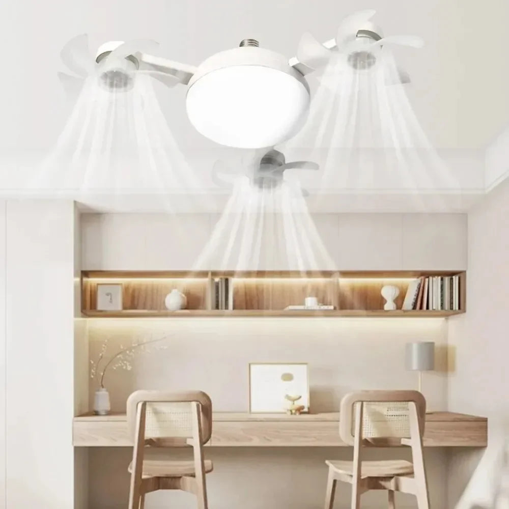 Modern white ceiling fan with integrated LED lights illuminating a kitchen or dining area.