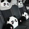 Black car seats with white panda plush headrests and lumbar support cushions.