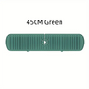 A 45cm green silicone faucet drain mat for kitchen and bathroom countertop protection.