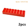 A red plastic building block set consisting of two pieces, measuring 12.8x3.2x1.9cm.