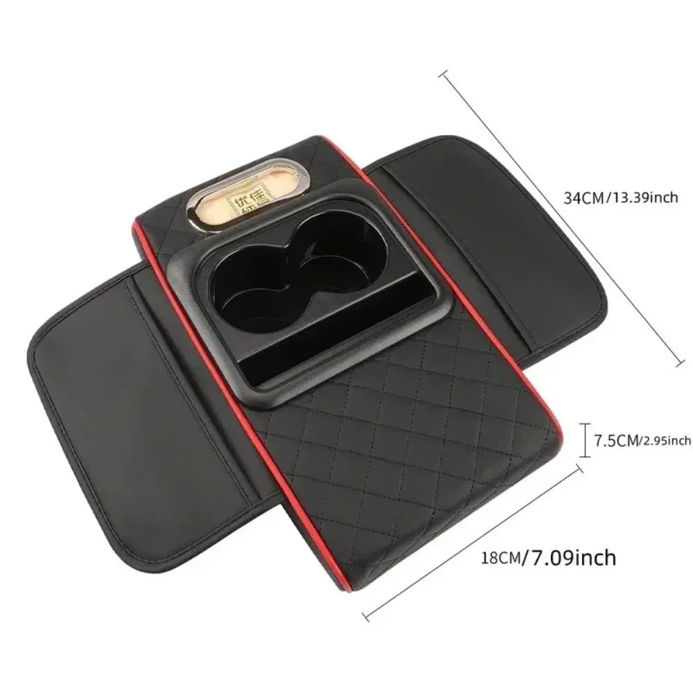Black car center console armrest with storage and cup holder featuring a textured surface.