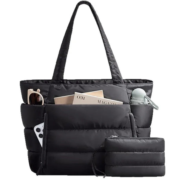 Black quilted multi-compartment tote bag with a shoulder strap
