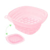 A pink foldable silicone ice bath and facial massage bowl with a removable tray.