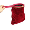 A deep red velvet magic bag with a pink handle and gold trim.