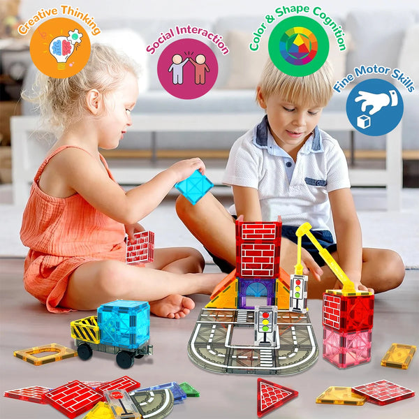 A child is building a structure with magnetic blocks on a mat, surrounded by various colorful magnetic pieces.