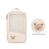 Light pink stroller hanging diaper bag featuring a cartoon embroidered bear patch.