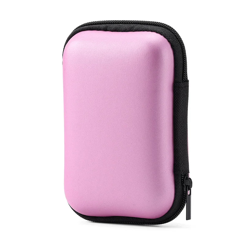 A pink hard EVA protective case for a SanDisk Extreme Portable SSD.