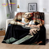 A throw blanket featuring a portrait of Eminem and 2Pac in a gritty style with a knife visible.