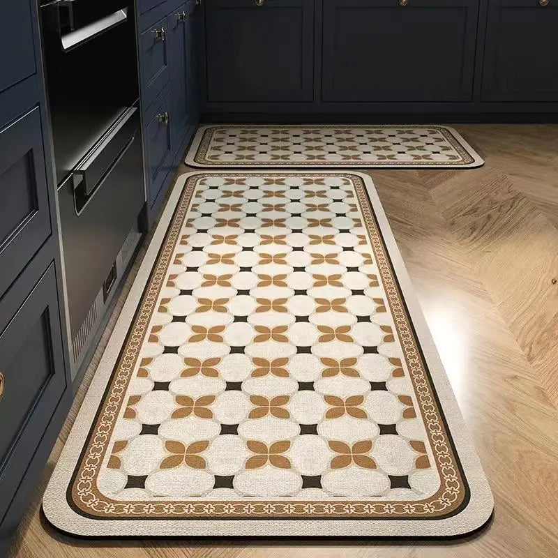 A long rectangular kitchen rug with a classic beige and brown geometric pattern is displayed on a wooden floor.