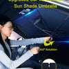 A woman is using an upgraded car windshield sun shade umbrella with 360 degree rotation in a car interior.