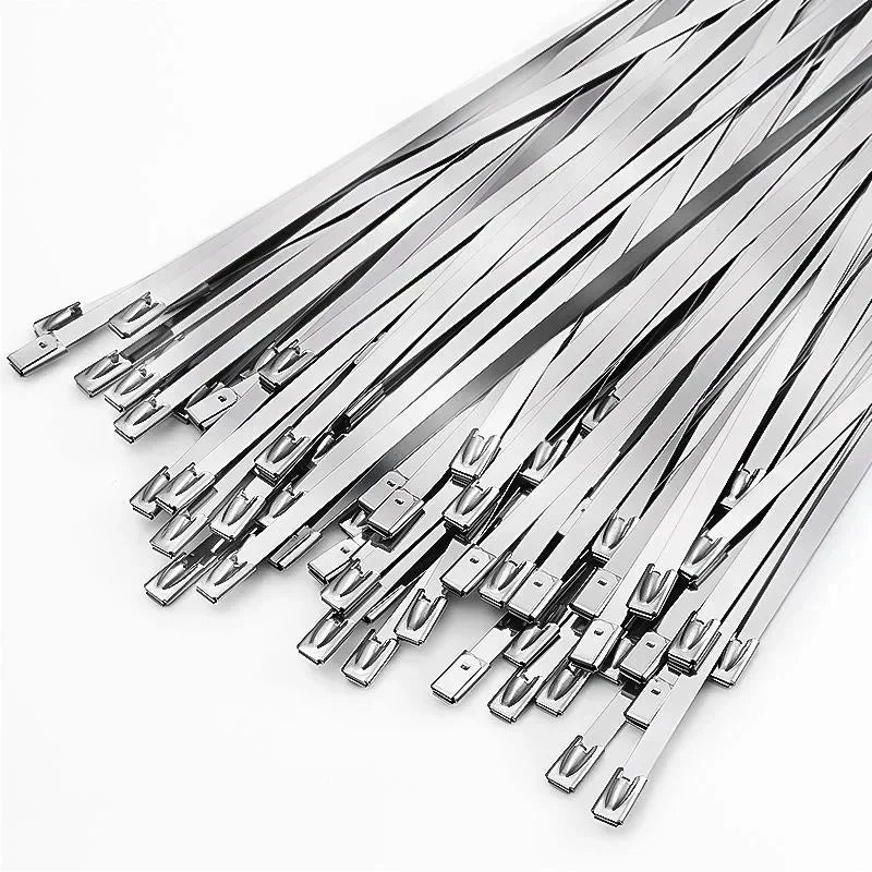 A collection of silver stainless steel cable ties arranged diagonally.