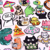 A collection of colorful cartoon cat embroidery patches featuring various cats and related characters.