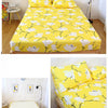 Yellow fitted bed sheet with a white floral pattern and an elastic band.