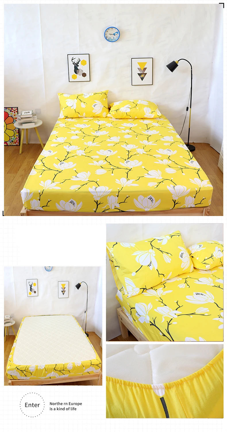 Yellow fitted bed sheet with a white floral pattern and an elastic band.