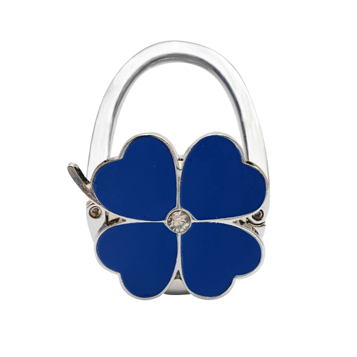 Silberige Handtaschenhake in Form eines blauen Vierblättrigen Klövers mit klarem Edelstein in der Mitte.