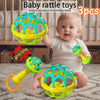 Three baby rattle toys in yellow and green colors are shown with a baby, demonstrating hand-holding ability.
