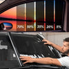 A person applies car window privacy film to a dark vehicle, demonstrating heat and UV blocking tint.