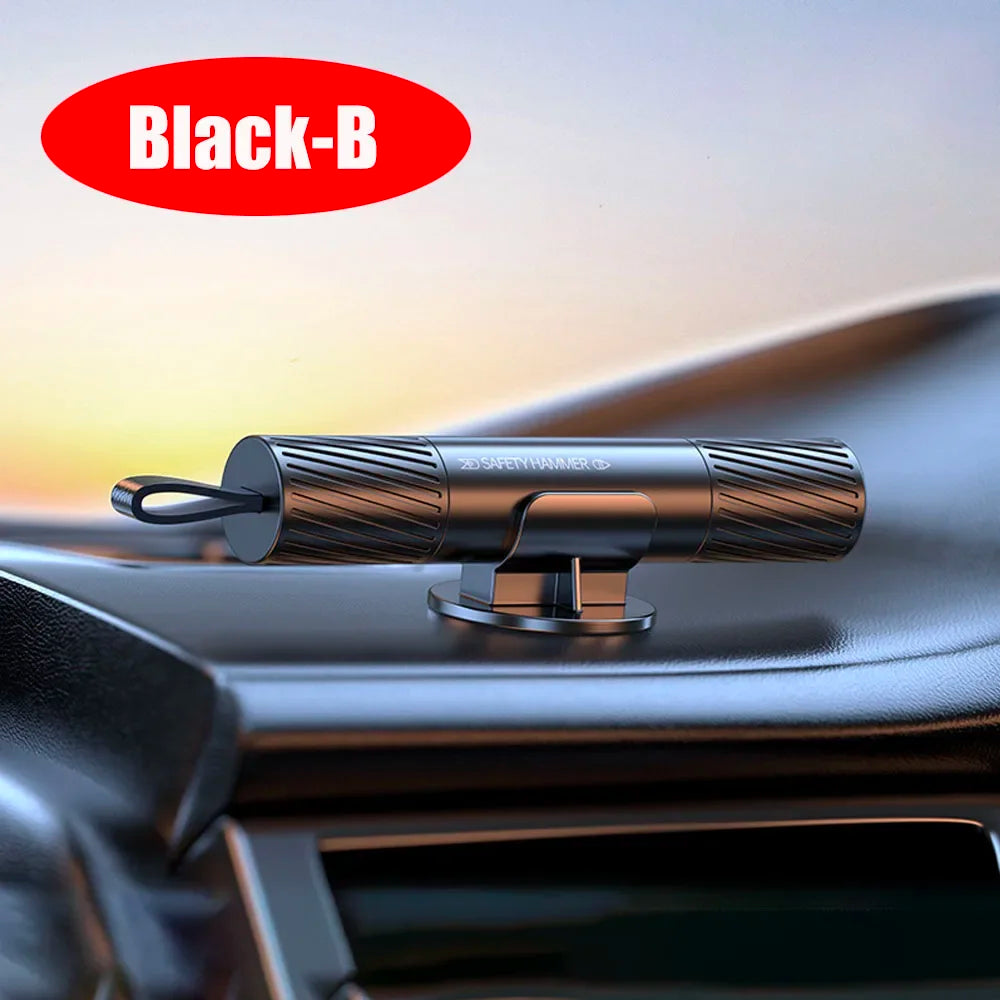 A close-up of a Black-B car emergency hammer with a seat belt cutter and window breaker resting on a car interior surface.