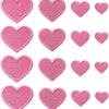A collection of twenty-four pink heart-shaped iron-on patches in various sizes and textures.