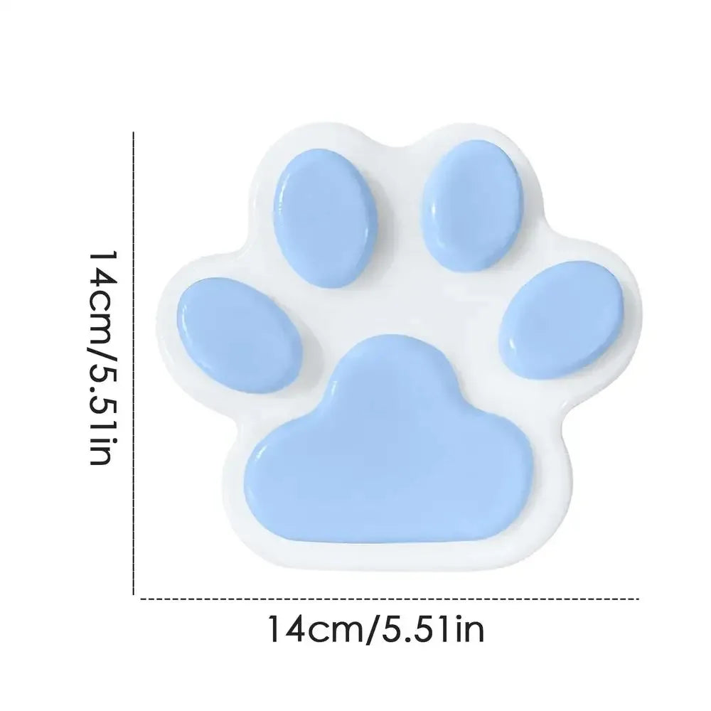 A white silicone cat paw squeeze toy with five blue paw shapes for stress relief and fidgeting.