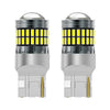 A pair of LED turn signal and reverse light bulbs with clear glass lenses and silver bases.