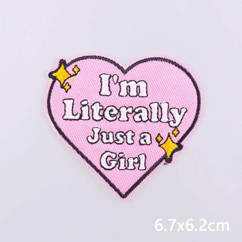 Pink heart shaped embroidery with the text I'm Literally Just a Girl