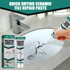 A tube of quick drying ceramic tile repair paste is being applied to a crack in a white ceramic sink surface.