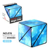 A blue and silver magnetic magic cube puzzle with a faceted design shown next to its packaging.