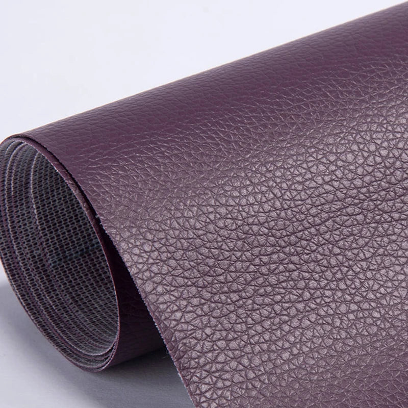 Roll of purple PU leather repair patches, showing the textured surface and rolled edge.