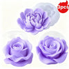 Three silicone candle molds featuring purple rose and peony flower designs.