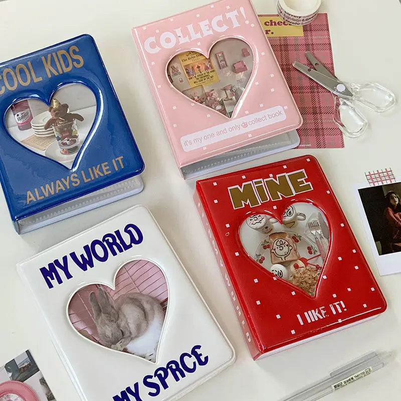 A collection of colorful mini photo albums titled Cool Kids, Collect, Mine, and My World featuring heart-shaped openings.