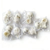 A collection of white articulated BJD collectible figurines packaged in clear plastic bags.