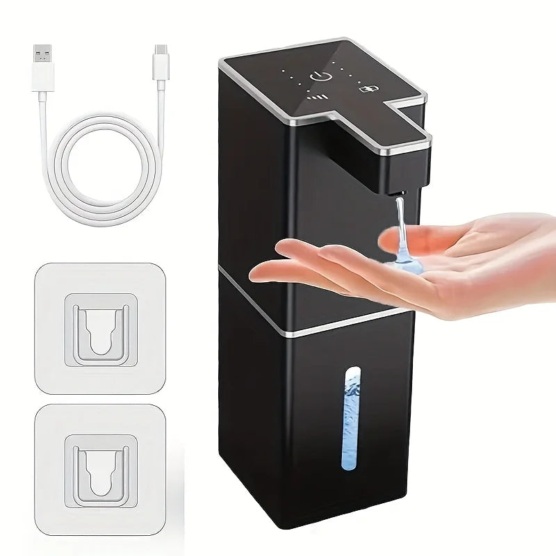A black touchless infrared smart soap dispenser is shown with a hand dispensing liquid soap.