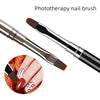 A set of black and silver phototherapy nail brushes shown next to a hand with nail art.