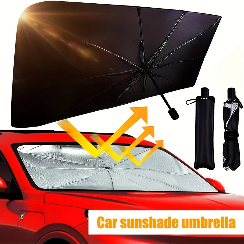 A black foldable car sunshade umbrella is shown covering a red car's windshield.