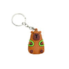 An adorable capybara keychain charm with brown fur and bright green accents.