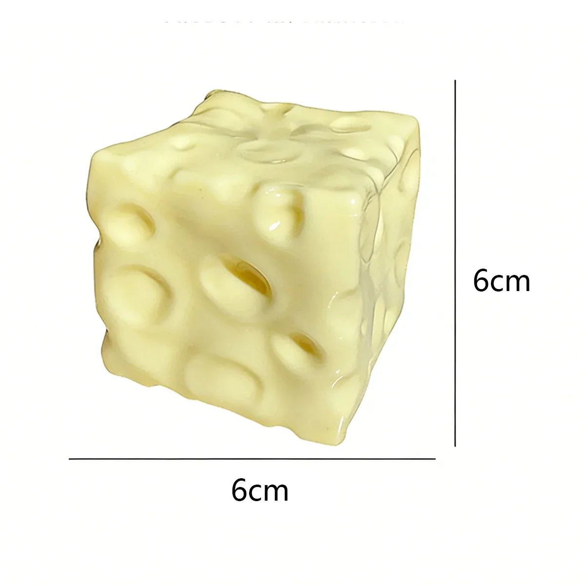 A pale yellow cheese-shaped stress relief squeeze ball with dimensions of 6cm by 6cm.
