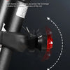 Adjustable light holder for a bicycle, showing the ability to adjust the light up and down.