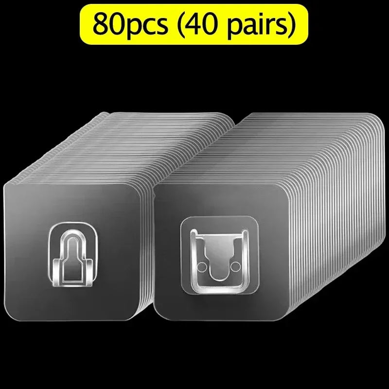 A set of 80 clear double-sided adhesive wall hooks packaged in a box.