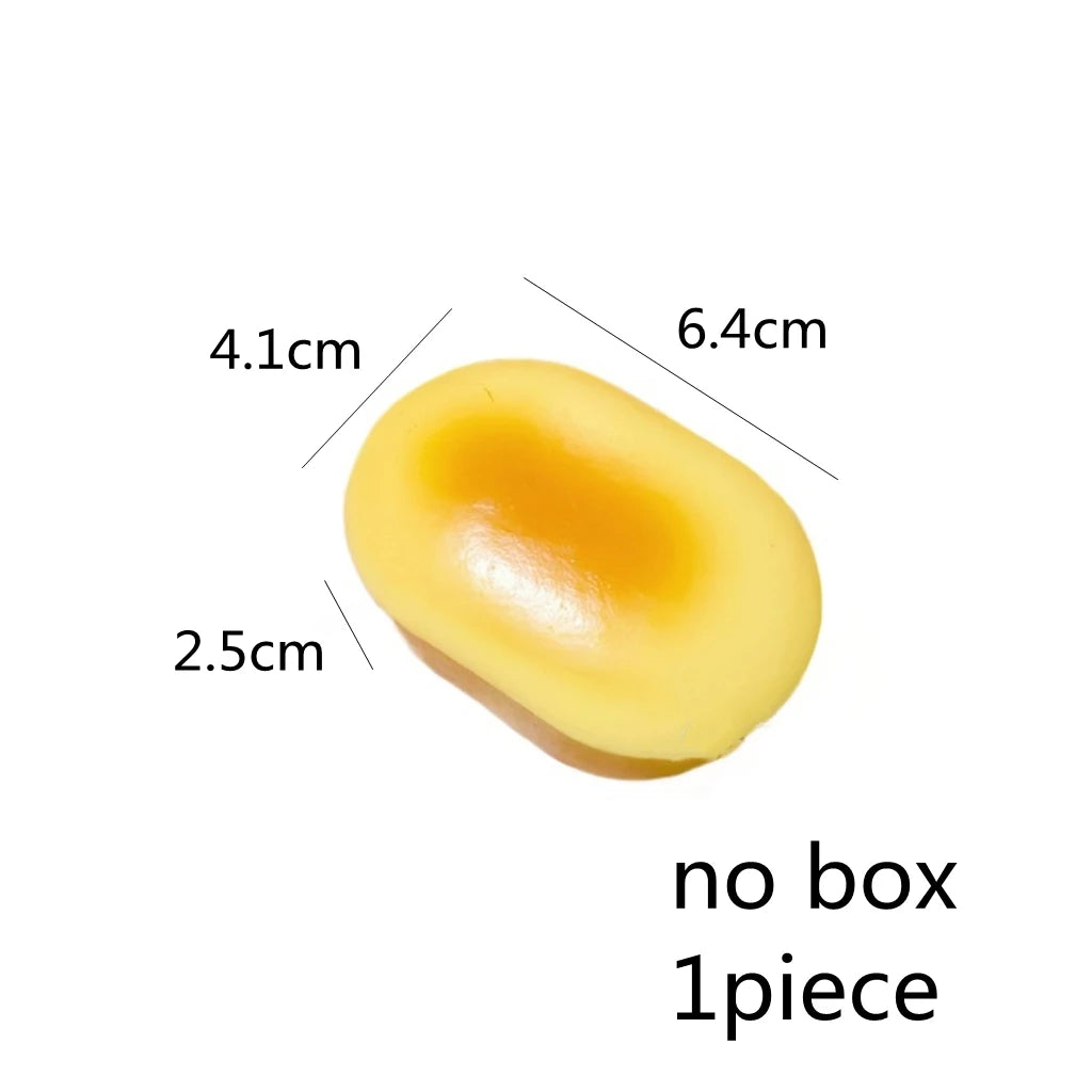 A yellow, oval-shaped squishy stress relief toy with dimensions 4.1cm by 6.4cm and a thickness of 2.5cm, shown as a single pi
