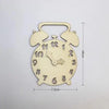 A round wooden clock face with twelve numbers and hands, designed for fine motor skill practice.