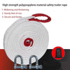 A roll of high strength polypropylene material safety trailer rope with red handles and metal clasps.